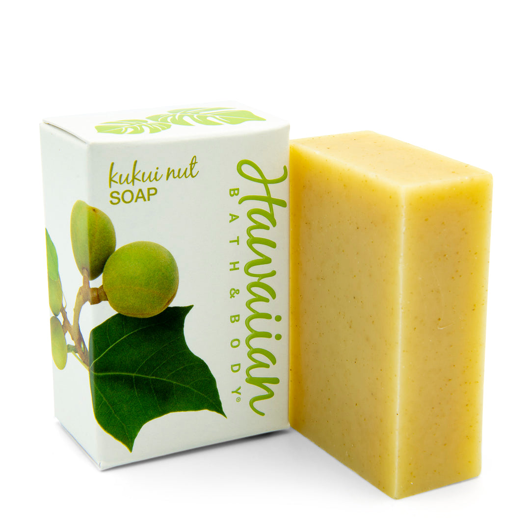 white box printed with a small kukui nut branch, next to a plain bar of soap - Hawaiian Bath & Body®