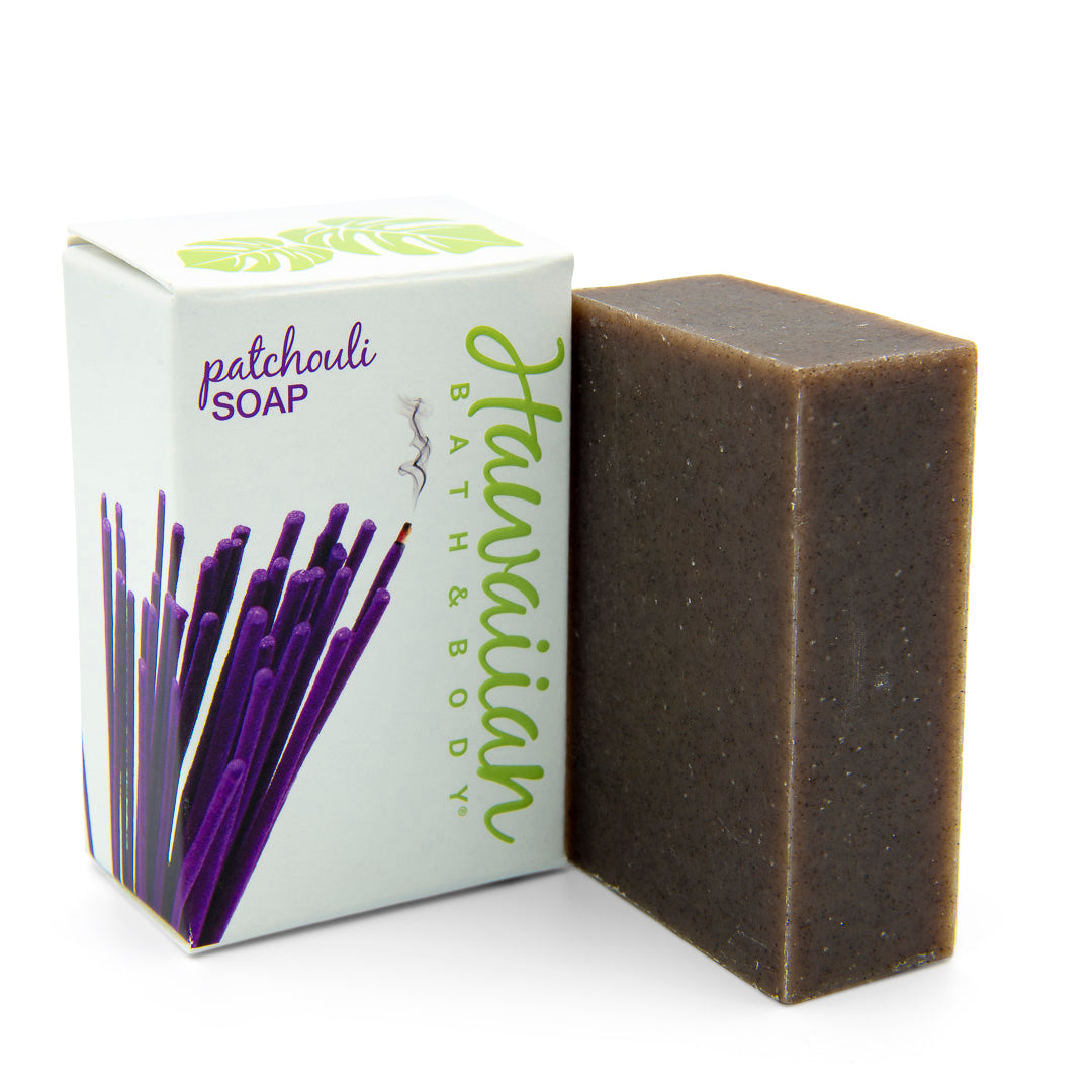 white box printed with a bunch of purple incense sticks, next to a dark bar of soap - Hawaiian Bath & Body®